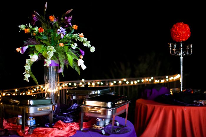 Buffet and floral display at night